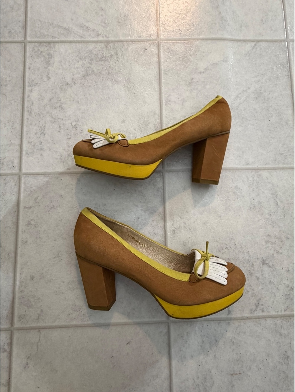 Tan and yellow platform heels